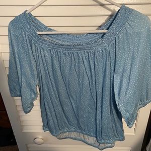 Light blue top with white polka dots